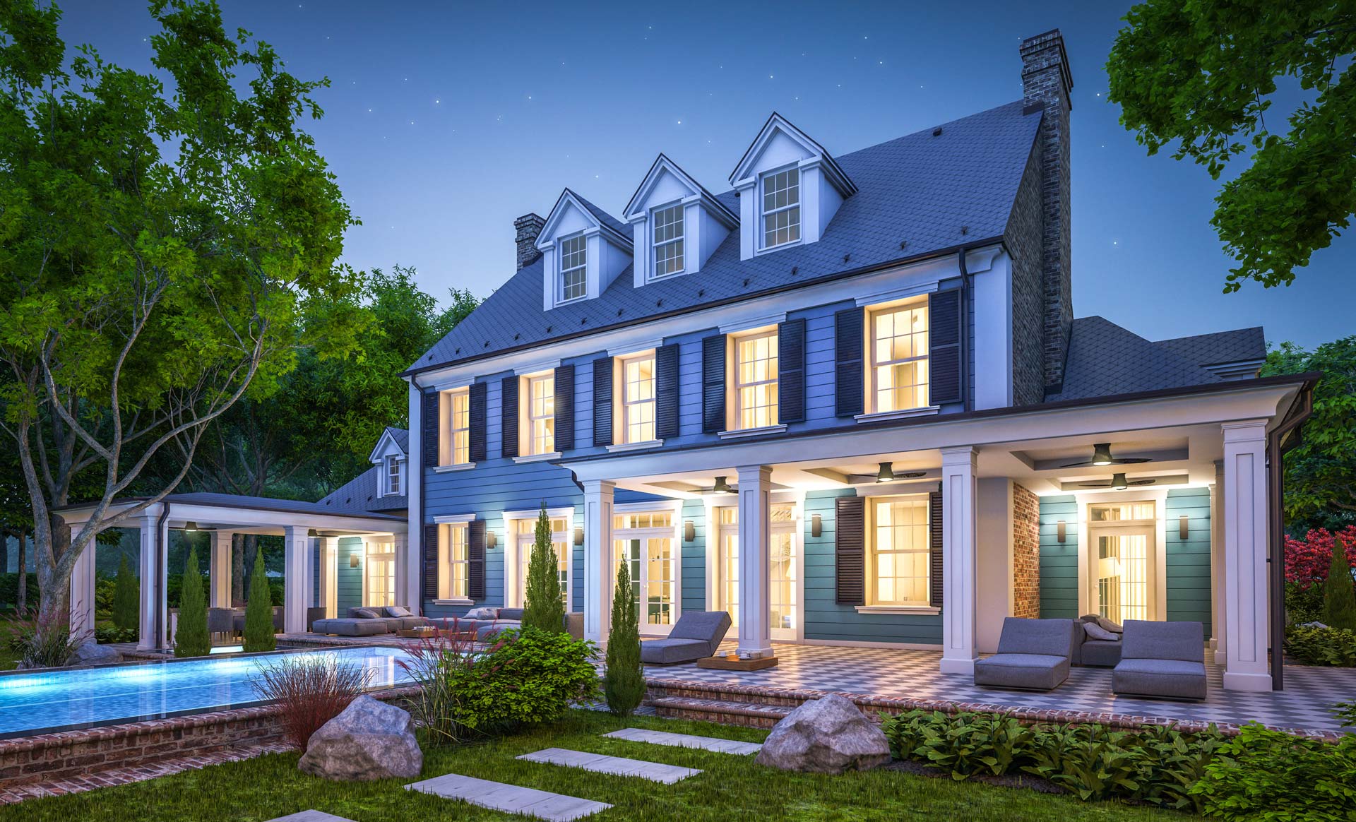 A two-story blue house with dormer windows and a wraparound porch. The backyard features a pool and lounge area, surrounded by trees and landscaping.